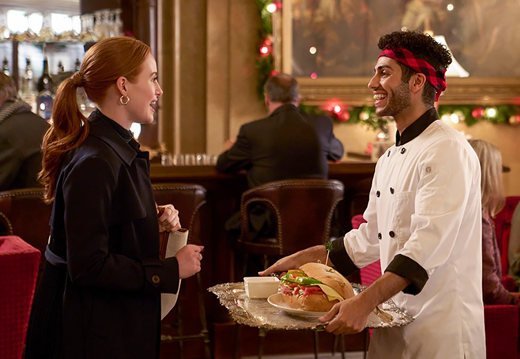 Madelaine Petsch and Mena Massoud Star in Christmas Rom-Com 'Hotel for the Holidays'